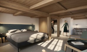 A modern bedroom with a large bed, a desk, and a chair. - Appenberg Hoteldorf, Seminare & Events (Mirchel)