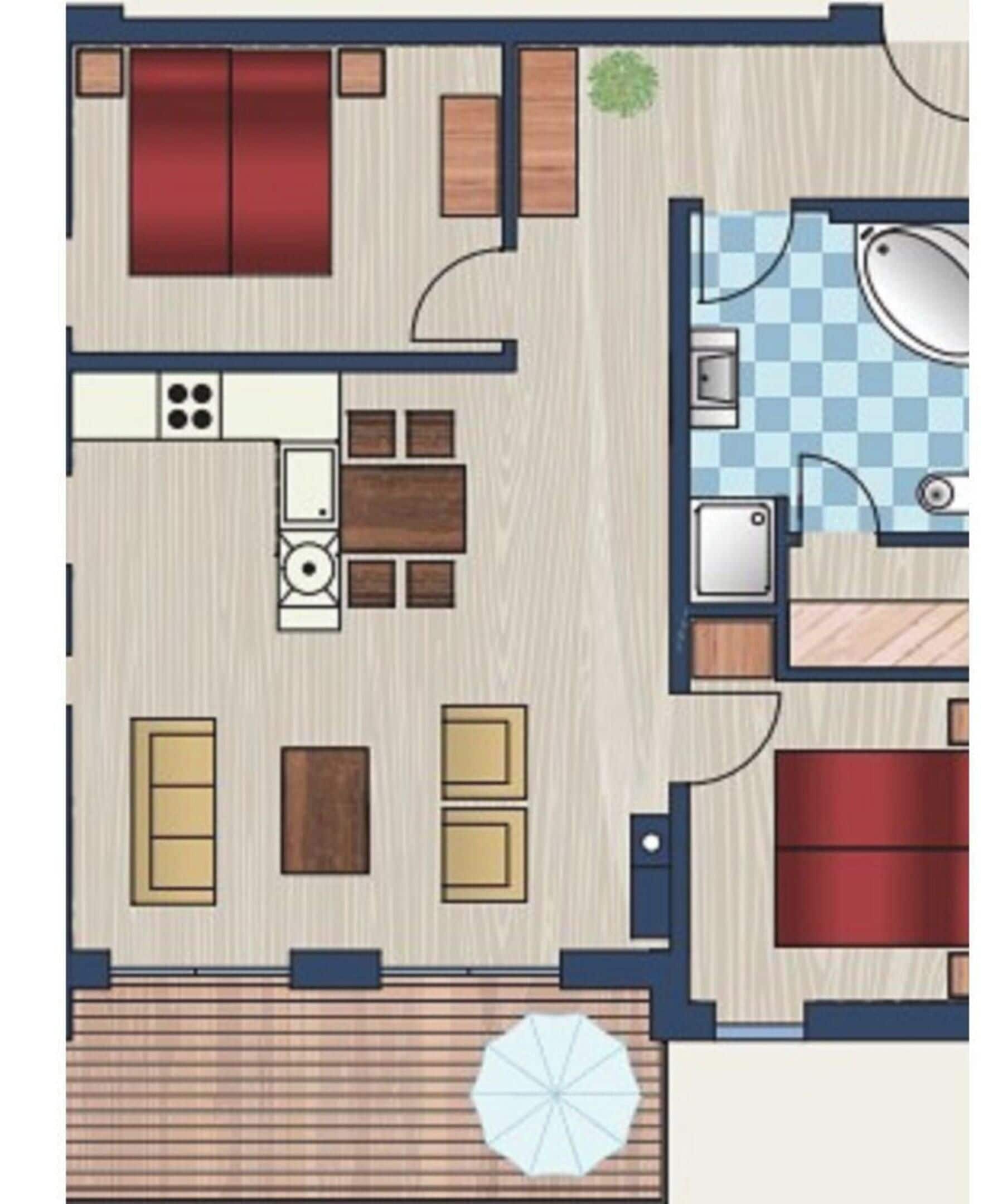 Ein Hotelzimmer mit Bett, Sitzecke, Küchenzeile, Bad und einem kleinen Balkon.