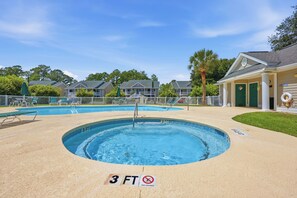 A pool area with two pools, a 3 ft depth marker, and a no diving sign. - 3 bedroom third floor condo with Golf Course View! (Pawleys Island)