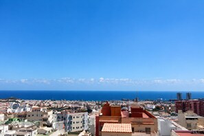 A coastal cityscape with a clear view of the sea and a variety of buildings, including residential and high-rise structures. - VV Vacation Health 1 (Santa Cruz de Tenerife)