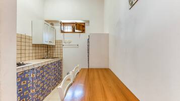 Fridge, stovetop, cookware/dishes/utensils