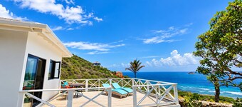 Brand New Romantic Ocean View Cottage with Private Deck at Turtle Beach