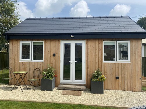 Self catering chalet in quiet village with village pub and pet friendly