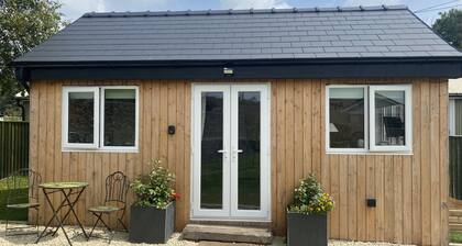 Self catering chalet in quiet village with village pub and pet friendly