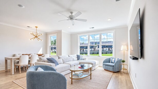 A modern living room with a sofa, armchairs, a coffee table, and a TV. - The Oak Grove, 3BR by Velvet Ditch Villas (Oxford)