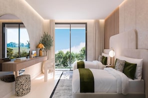 Habitación de hotel moderna con una cama grande, un escritorio y vistas al exterior.
