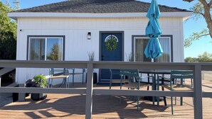 Outdoor dining - Brand New! Two Bedroom Farmhouse, 2 Queens + 2 Twin air mattresses by request. (Fallon)