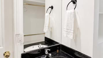 Shower, towels, soap, toilet paper