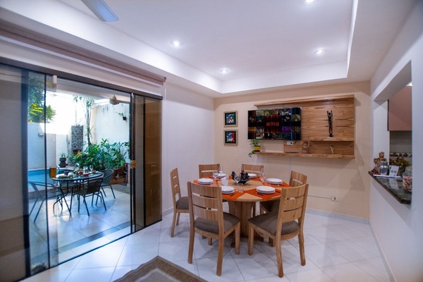 Dining area opening to pool terrace