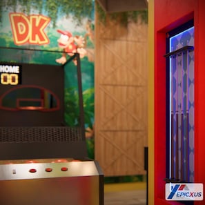 A kitchen area with a grill, a sign with 'DK' and 'HOME' on it, and a wooden wall with a geometric pattern. - The Epic 11025 Paradiso Grande Resort Orlando Florida (Orlando)