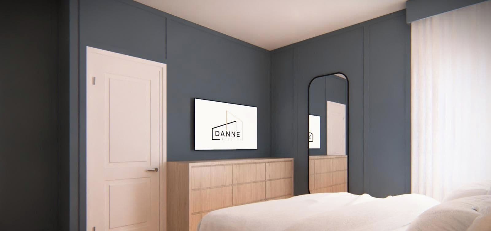 Ein modernes Schlafzimmer mit einem Bett, einer weißen Tür, einem gerahmten Bild und einem Spiegel.