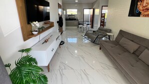 Apartamento família | Área de estar