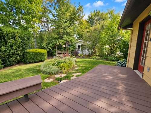 Hot tub, private bridge, large patio, and secret garden property to explore