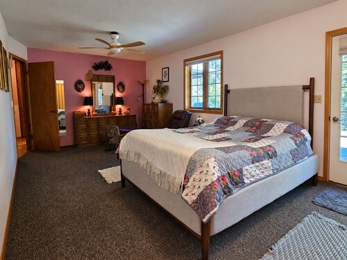 Hot tub, private bridge, large patio, and secret garden property to explore