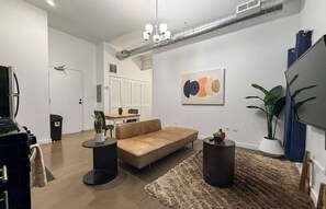 TV, offices - Modern Comfort: 1BR Unit w/ Laundry (Chicago)