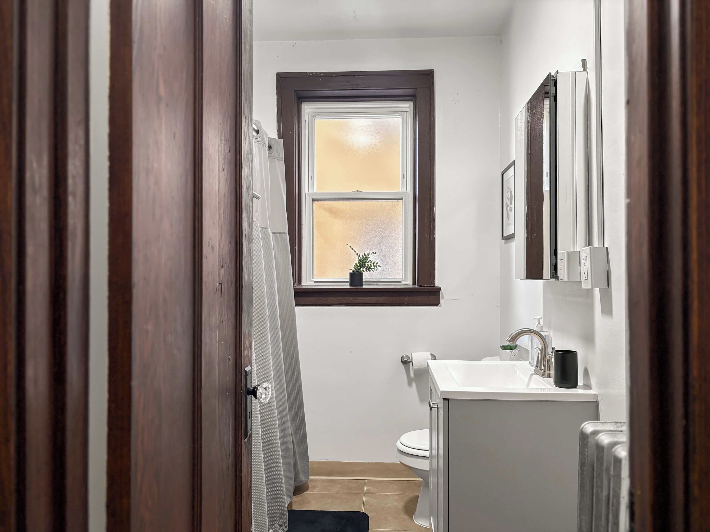 Shower, hair dryer, towels, shampoo