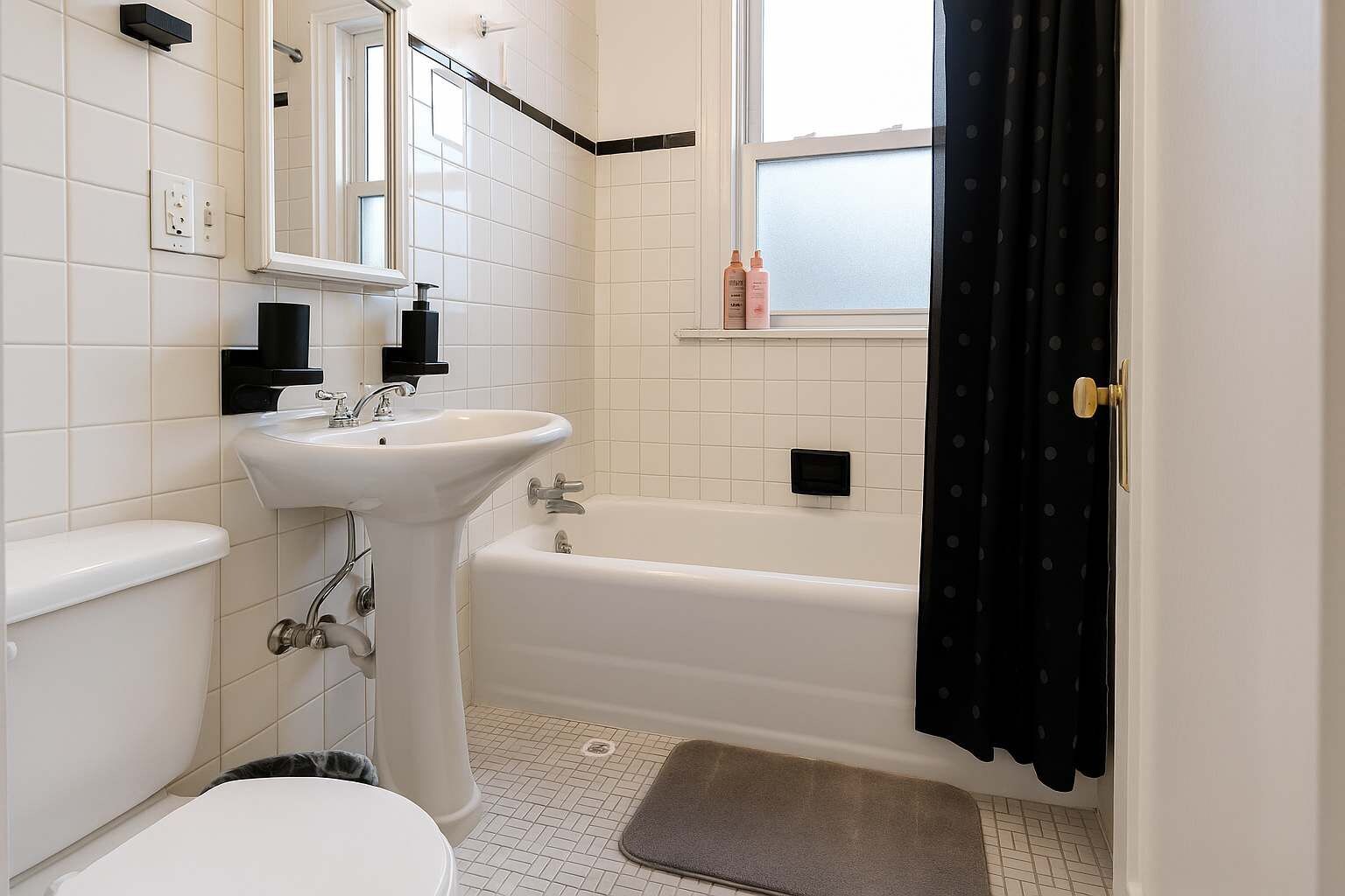 Shower, hair dryer, towels, shampoo