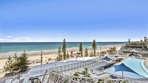 A resort with a pool, beach, and ocean view. - Esplanade Soul Apartment 402 (Surfers Paradise)