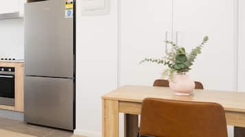 Enjoy the convenience of a modern kitchen alongside a cosy dining nook, perfect for preparing a home-cooked meal and enjoying a relaxed breakfast or dinner during your stay.