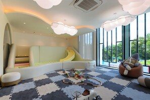 A children's play area with a slide, soft seating, and a play mat. - Bang Tao - 4 Beds for Families (Choeng Thale)