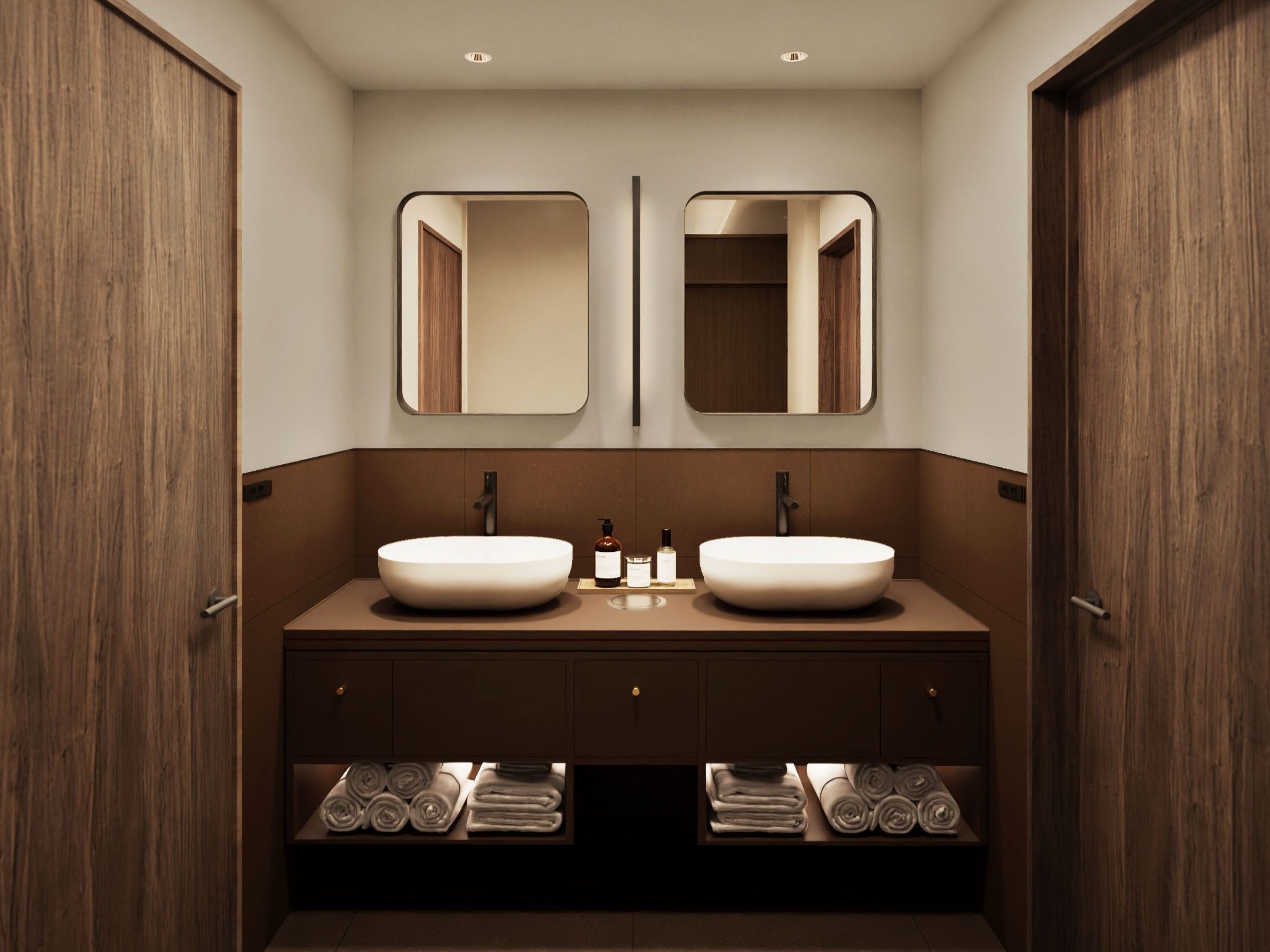 Ein modernes Badezimmer mit zwei Waschbecken, Spiegeln und einem Handtuchhalter.