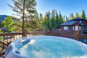 A hot tub on a wooden deck with a view of a house and trees. - Steps to Dtwn & Peak 9 Lifts! Hot Tub Hideaway (Breckenridge)