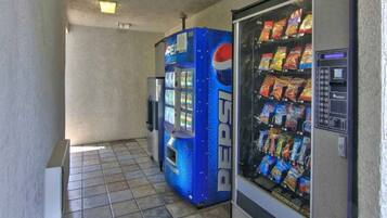 A vending machine area with a Pepsi-branded machine and a snack vending machine.