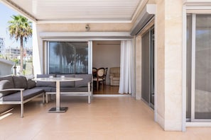 Apartment, 3 Bedrooms, Balcony, Garden View | Outdoor dining - Beachfront 3BR Apartment with Sea Views (Ayios Tychonas)