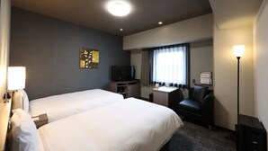 A hotel room with two beds, a desk, a television, a chair, and a lamp. - HotelRouteInnKobesanda-ShinSandaEkimae- (Sanda)
