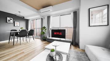 Apartment | Living area | 43-inch flat-screen TV with digital channels