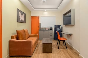 Habitación ejecutiva, vistas a la ciudad | Zona de estar