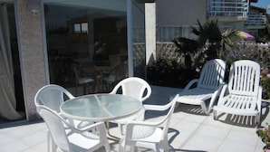Outdoor dining - APART HOTEL PLAYA BLANCA - BAHÍA INGLESA - C1 (Caldera)