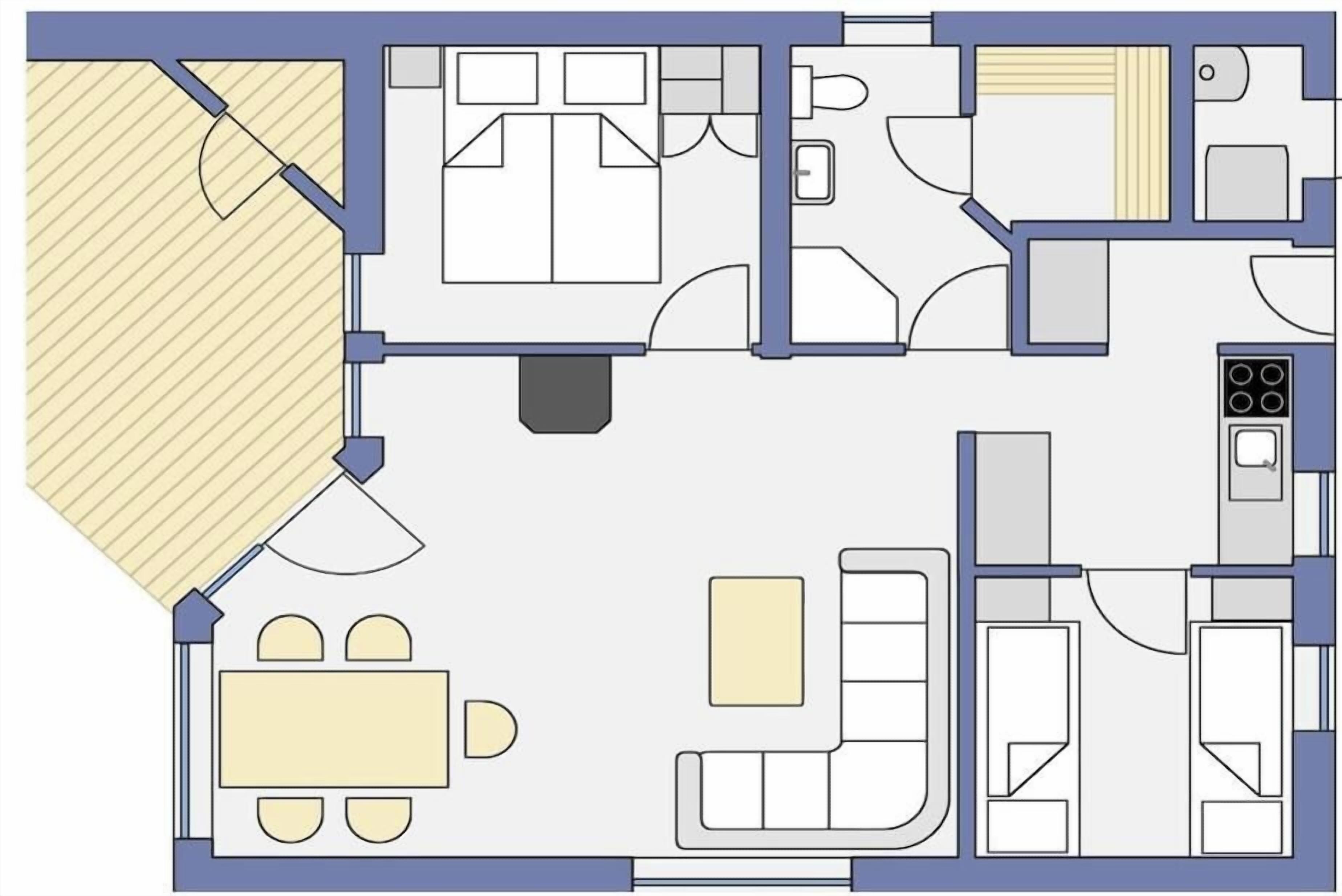 A floor plan with a dining area, kitchen, and a living space with a sofa and a TV.