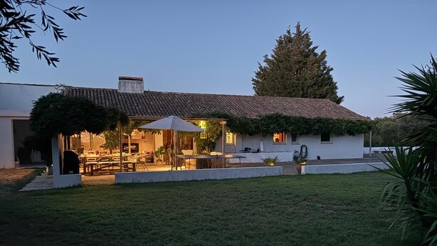 A residential property with a patio area, outdoor seating, and a covered section. - Country House 'Monte Do Campaniço' with Mountain View, Private Pool and Wi-Fi (Tanganheira)