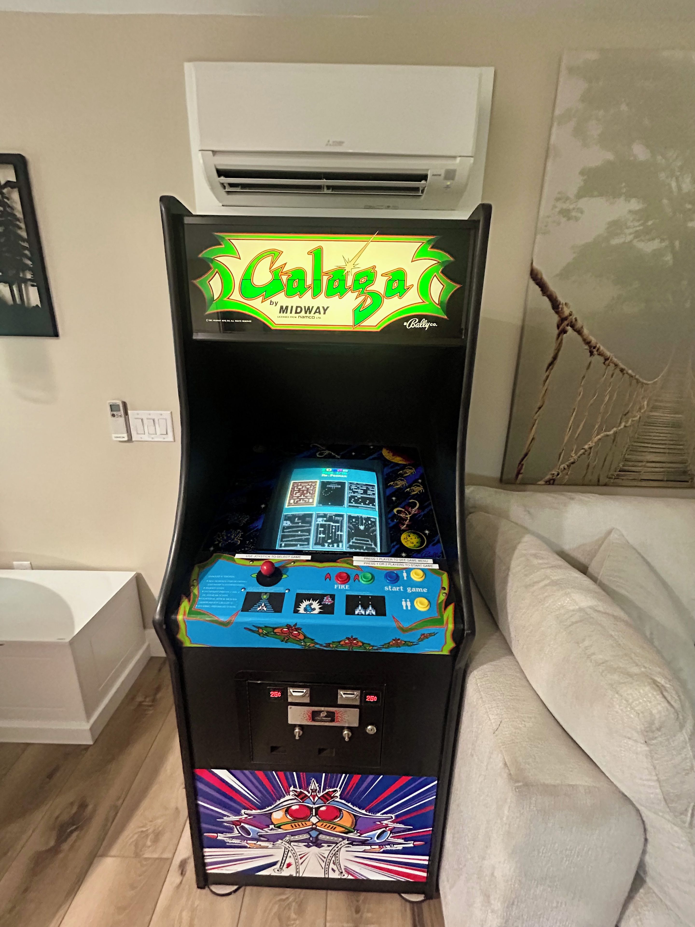 A retro arcade machine with a vibrant display and a classic design.