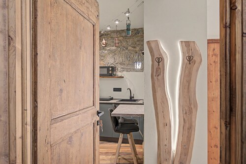 Room 'Camera Boscaiolo' with Kitchenette and Mountain View Balcony