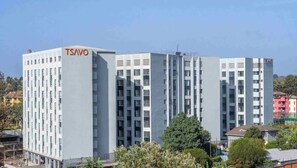 A multi-story building with the name 'TSAVO' on the facade. - Studio apartment at Tsavo sunset (Kiambu)