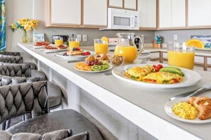 A breakfast buffet with various dishes and drinks. - Oceanfront 2BR/2BA -Bay Watch 1509- Great Balcony (North Myrtle Beach)