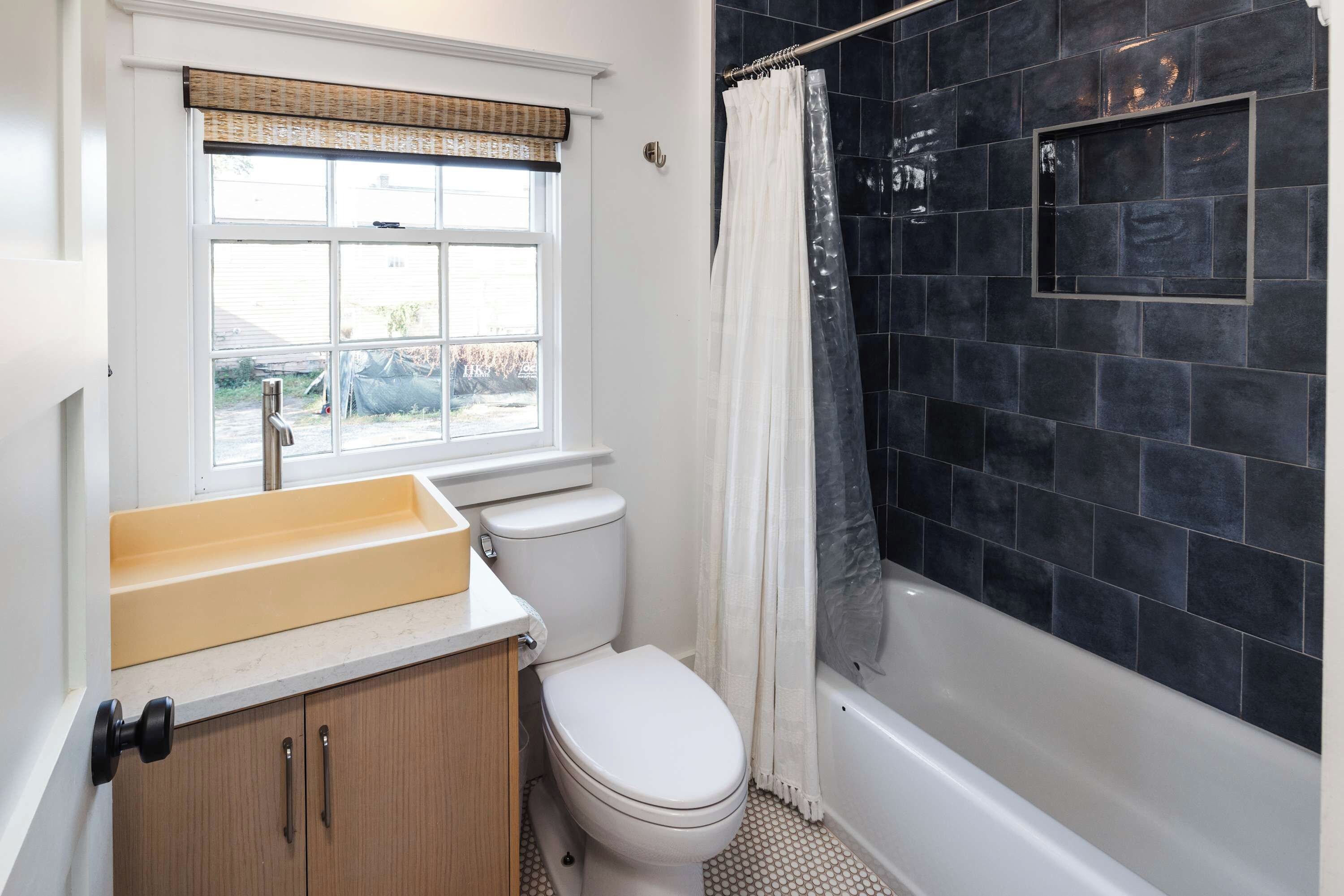 Shower, hair dryer, towels, shampoo
