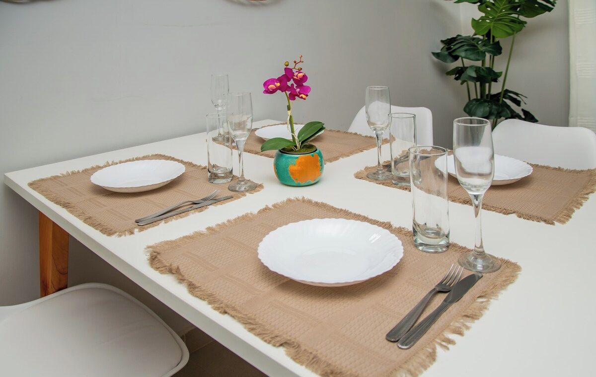 Dining table set for four