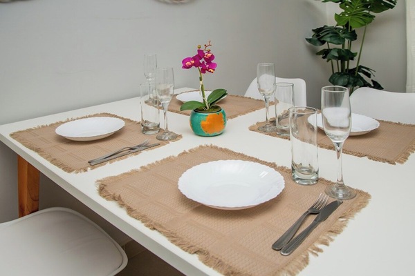 Dining table set for four