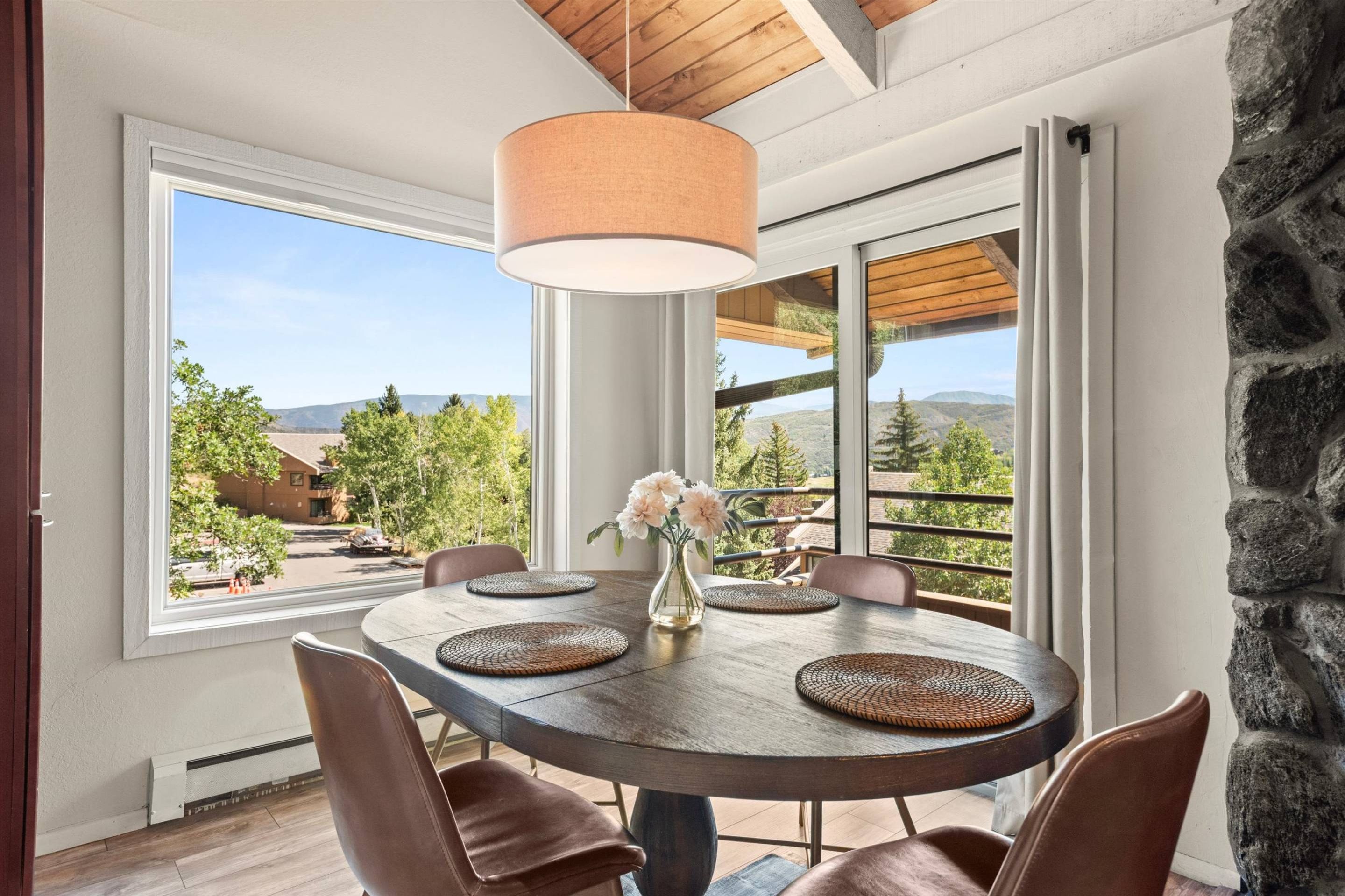 Enjoy corner window views from the dining table