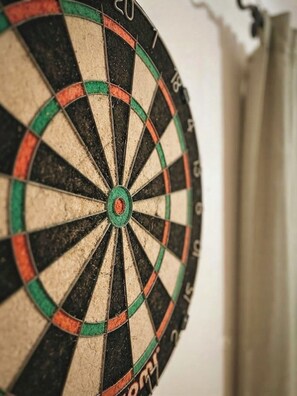 A dartboard with a bullseye and numbered scoring rings.
