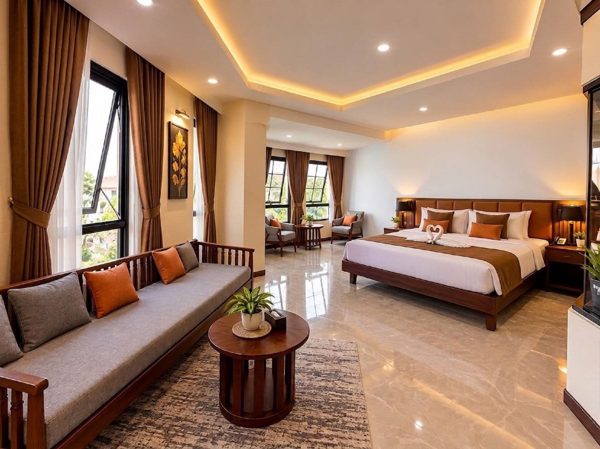 Habitación de hotel con una cama grande, un sofá, una mesita de centro y vistas al exterior.
