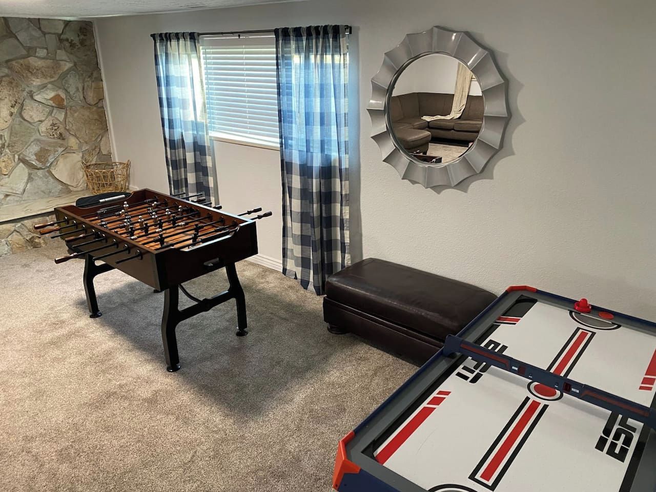 Game area with foosball and air hockey