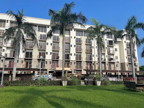 Cozy, Spacious one-bedroom Condo with relaxing porch in a peaceful Bacolod.