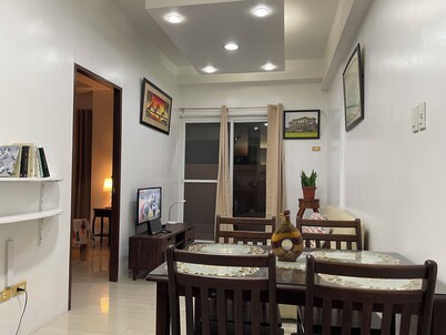 Cozy, Spacious one-bedroom Condo with relaxing porch in a peaceful Bacolod.