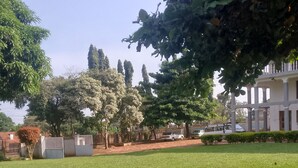 Deluxe Quadruple Room, Courtyard View | Property grounds - Seven Days Motel (Entebbe)