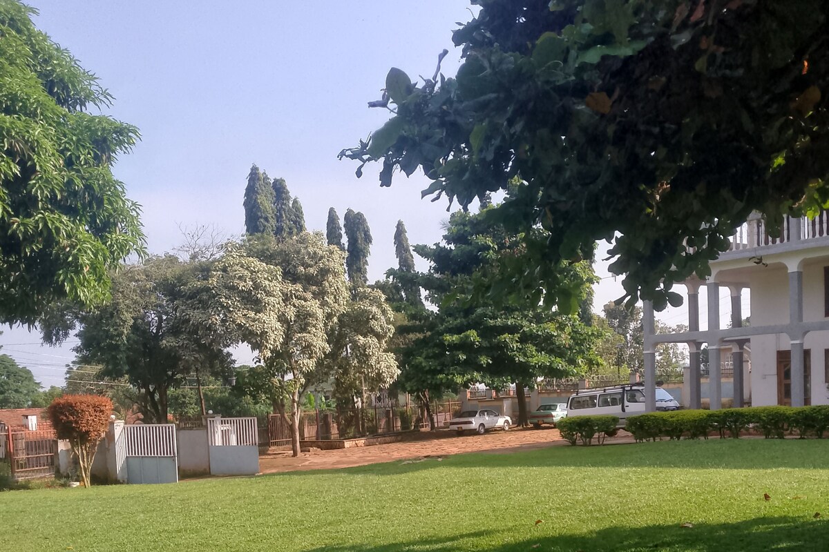 Deluxe Quadruple Room, Courtyard View | Property grounds