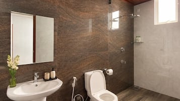 A bathroom with a sink, toilet, and shower.